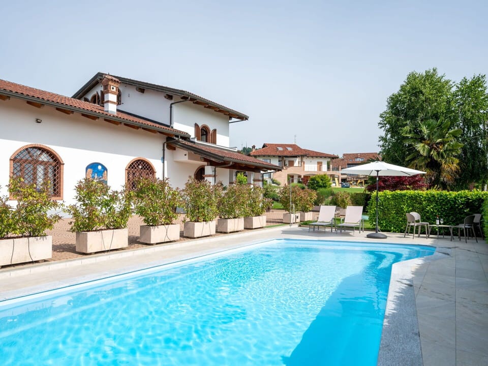 Water, Plant, Sky, Property, Swimming Pool, Building, Azure, Tree, Shade, Leisure