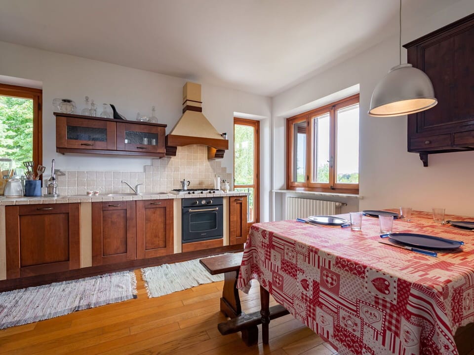 Cabinetry, Furniture, Countertop, Kitchen, Wood, Window, Interior Design, Lighting, Flooring, Drawer