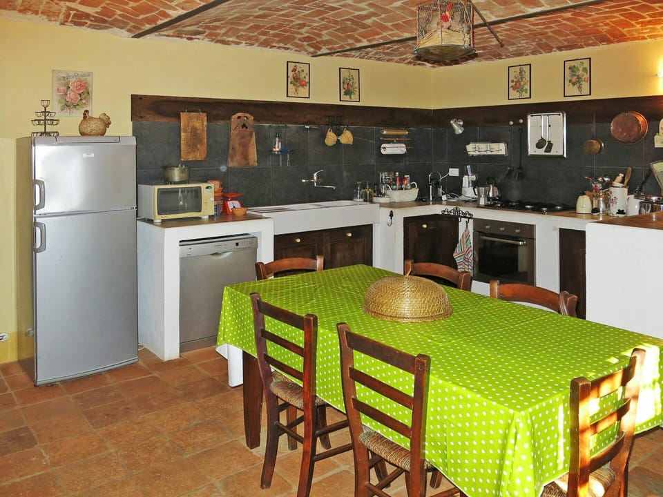Furniture, Table, Property, Cabinetry, Countertop, Chair, Kitchen Appliance, Architecture, Kitchen Stove, Interior Design