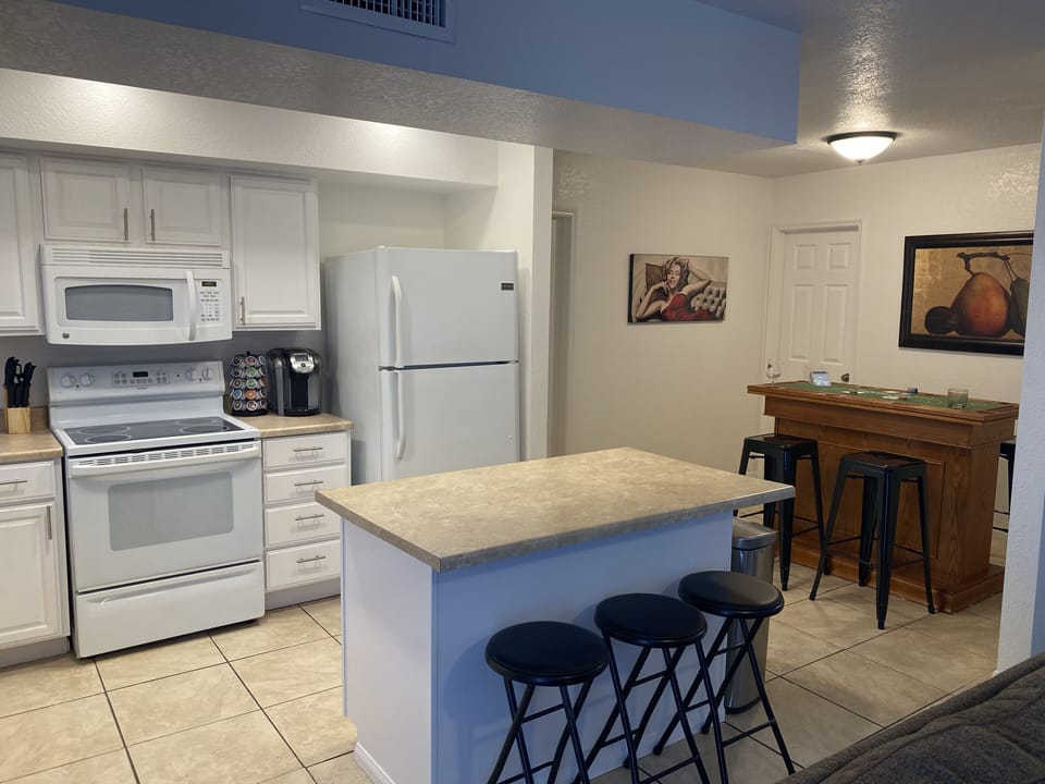 Kitchen has a Keurig coffee machine and stocked K-Cups.