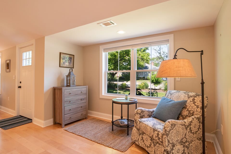 The light-filled reading nook is perfect for relaxing, reading,  or napping.
