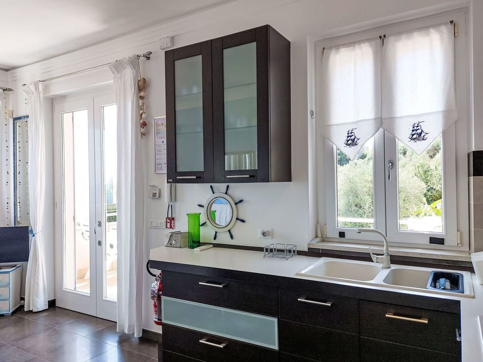 Furniture, Kitchen, Countertop, Cabinetry, Interior Design, Kitchen Appliance, Flooring, Home, Lighting, Major Appliance