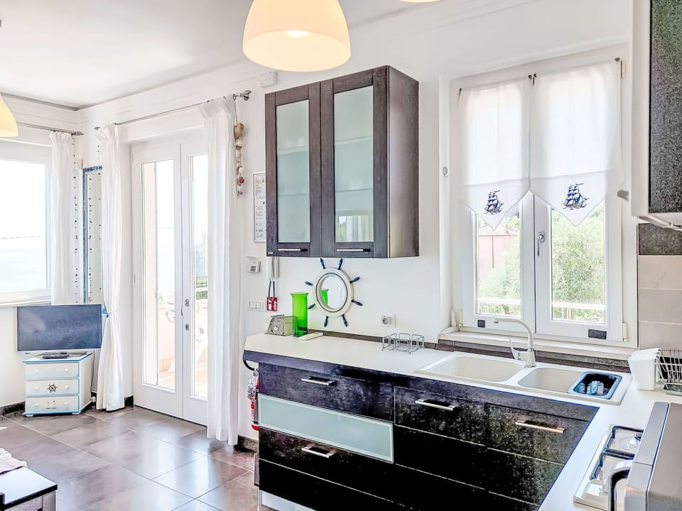 Furniture, Kitchen, Interior Design, Countertop, Cabinetry, Flooring, Kitchen Appliance, Major Appliance, Floor, Ceiling