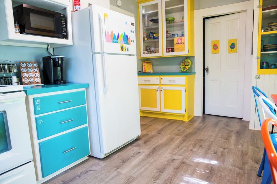 Bright, happy kitchen with vintage charm, coffee bar & all you need to cook!