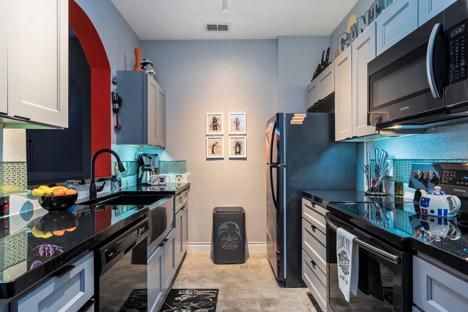 Black stainless steel appliances & apron sink. Sleek! Completely renovated and all new 