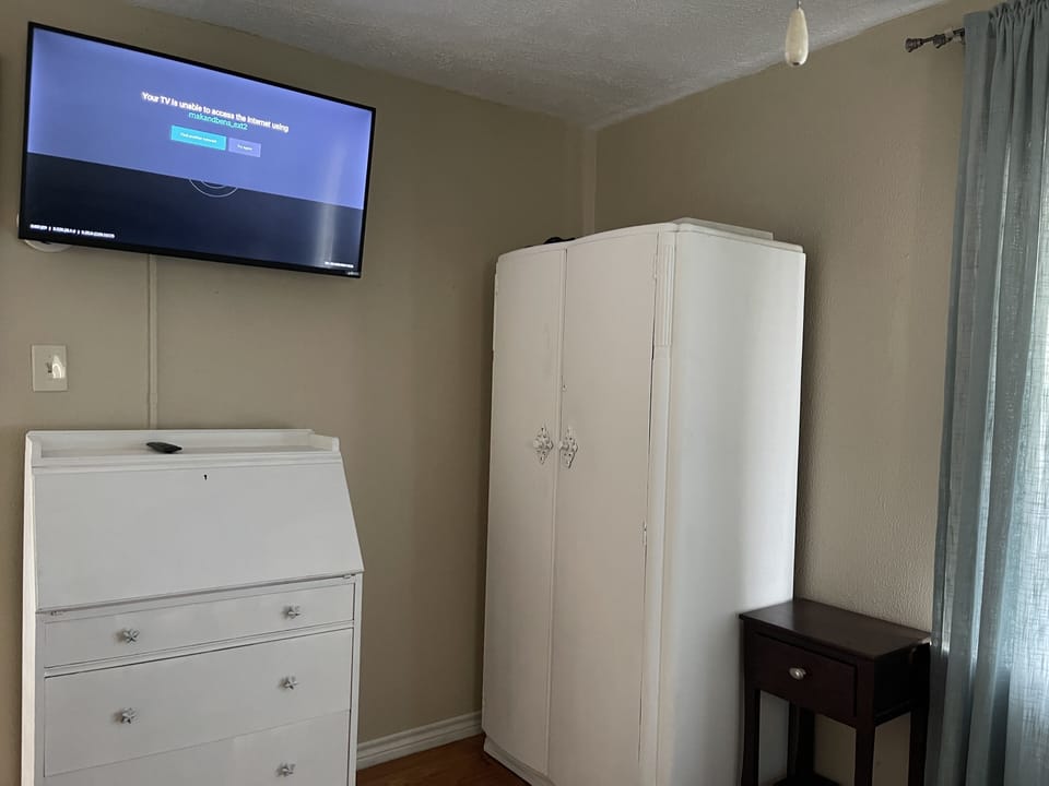 Desk, dresser and armoire.
