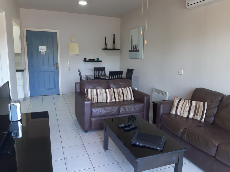 Living/TV and dining area. 