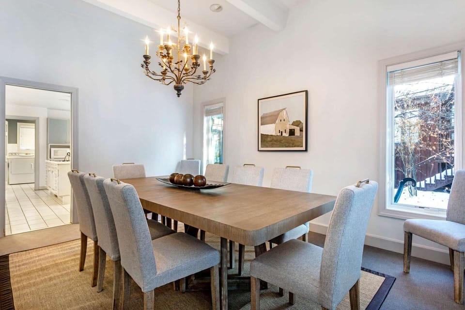 Dining area for 8-10 is conveniently located next to the Kitchen.