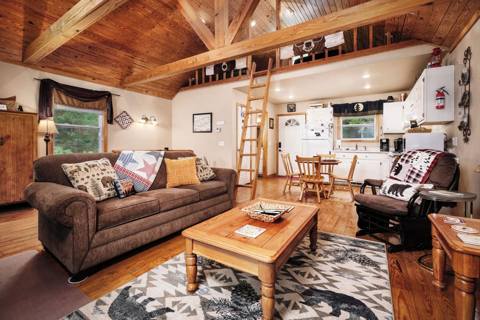 Living area, kitchen and loft