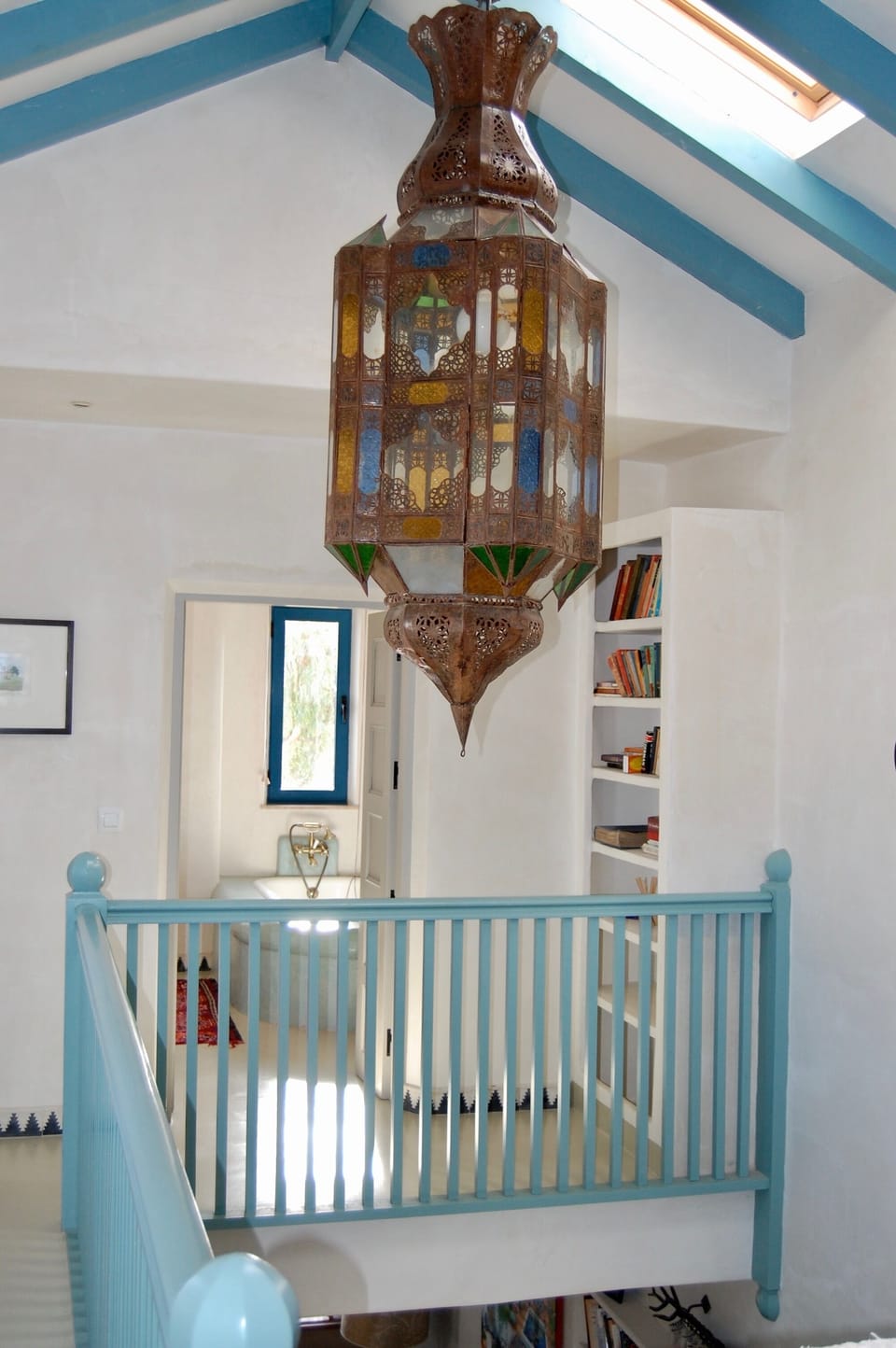 Casita upstairs hall towards the bathroom & looking down to the living room