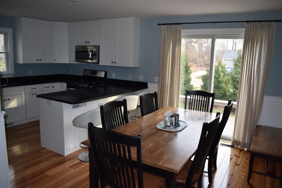 Dining Area.  Table will sit 8 with bench