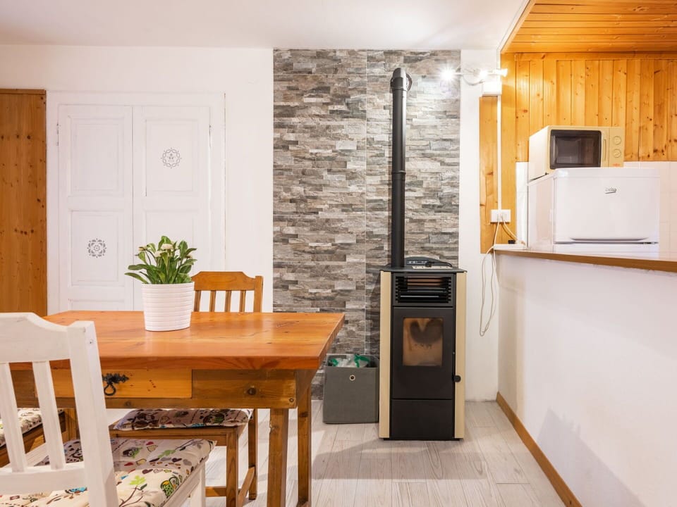 Cabinetry, Furniture, Property, Countertop, Table, Plant, Wood, Kitchen, Interior Design, Kitchen Appliance