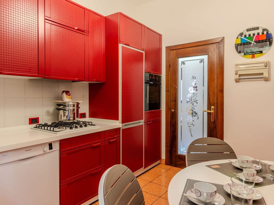 Cabinetry, Property, Furniture, Building, Table, Lighting, Countertop, Interior Design, Kitchen Stove, Kitchen Appliance