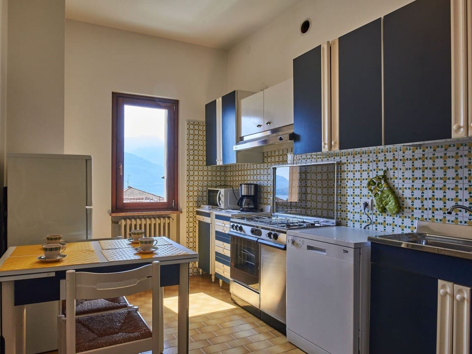 Property, Cabinetry, Furniture, Countertop, Sink, Kitchen, Interior Design, Table, Wood, Floor