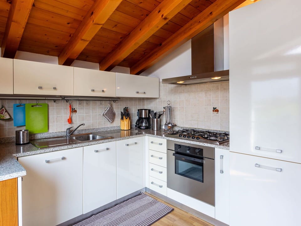 Countertop, Cabinetry, Property, Sink, Kitchen Sink, Kitchen Stove, Kitchen Appliance, Kitchen, Wood, Cooktop