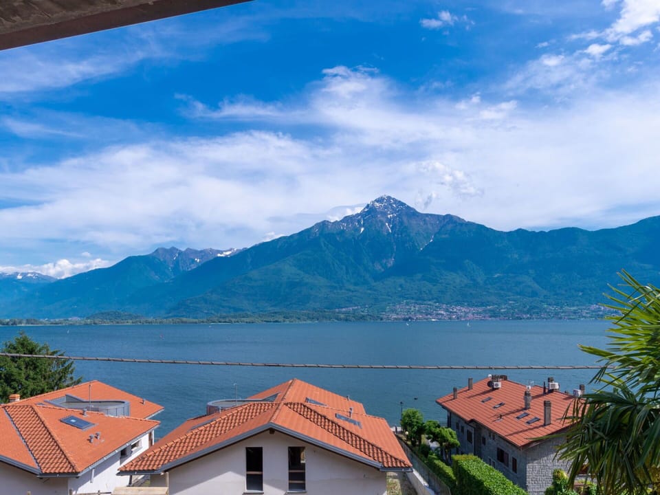 Cloud, Sky, Water, Mountain, Property, Blue, Building, Azure, Highland, Natural Landscape
