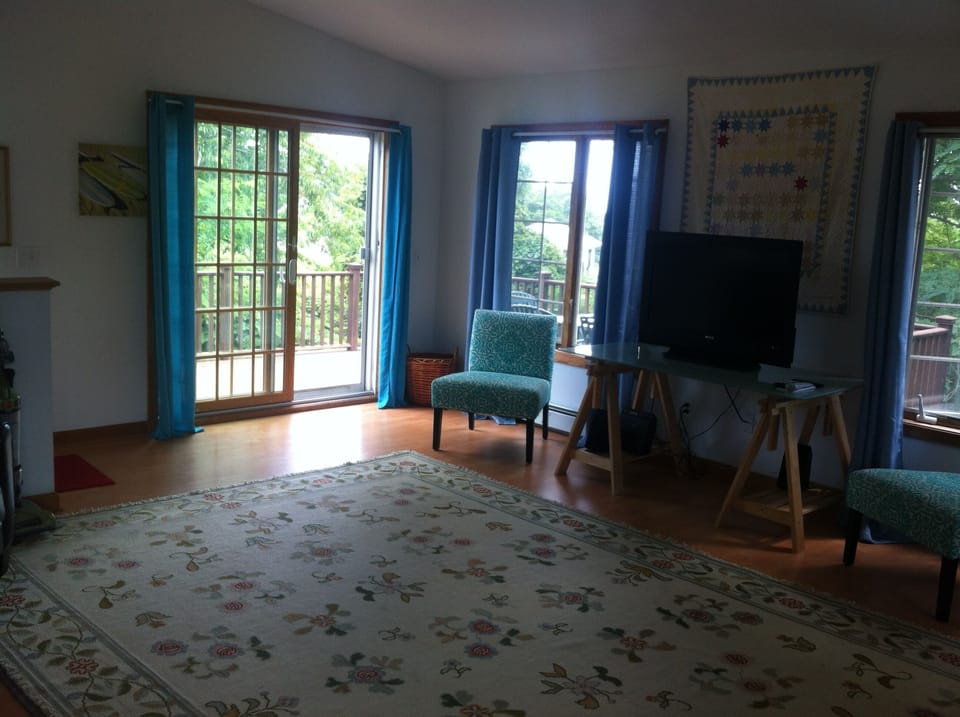 2nd floor room leading to large outdoor deck