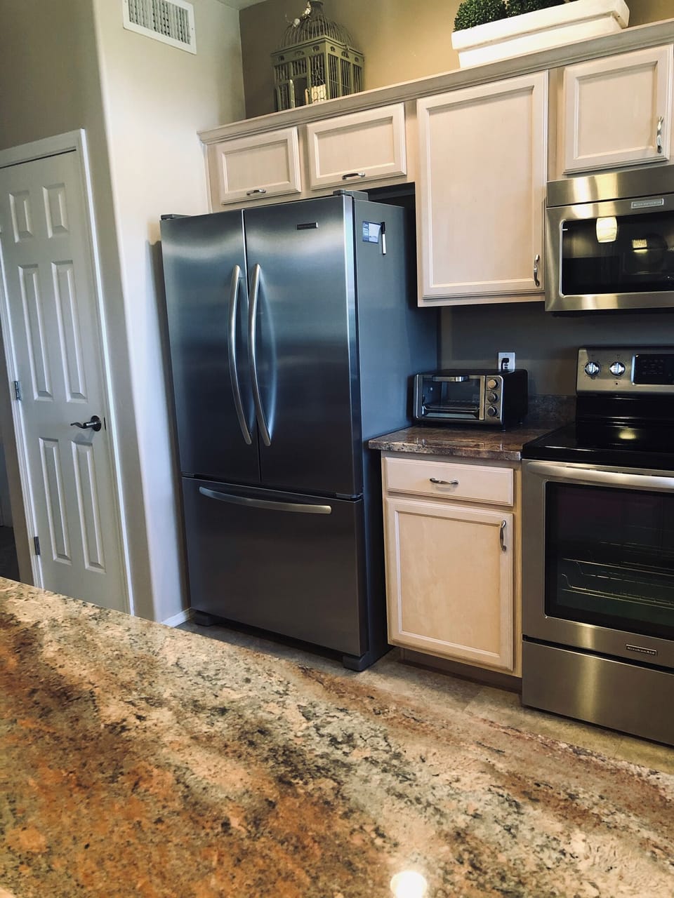 Refrigerator with filtered water and ice maker