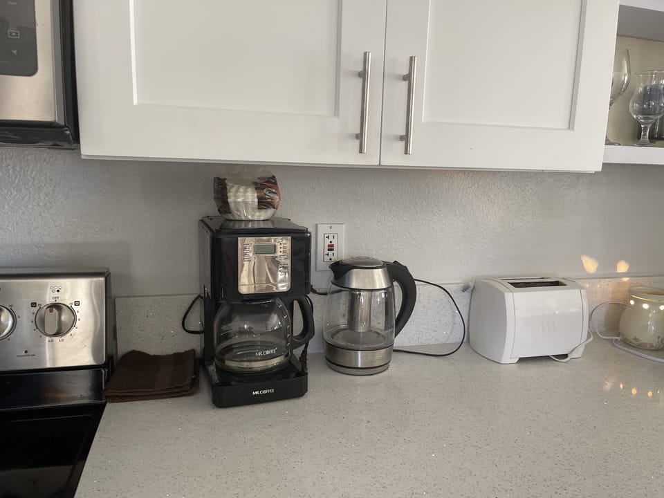 Coffee machine  and complimentary coffee.
