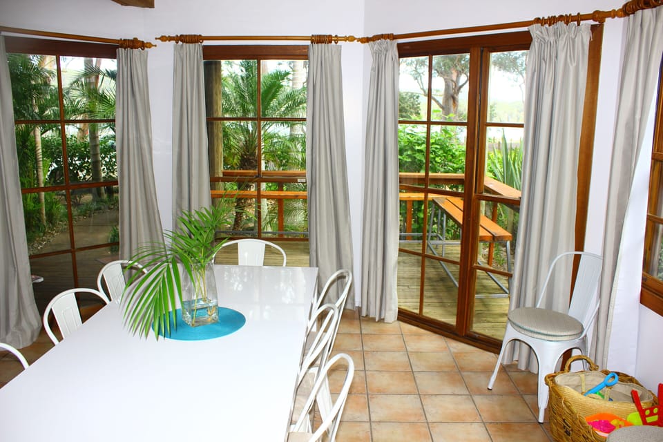 Light--filled dining room with views to the lake.