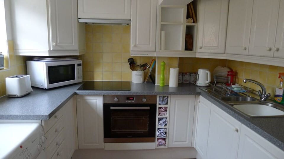 Ample crockery/cooking utensils etc/slow cooker/tea towels/paper roll/soaps etc.