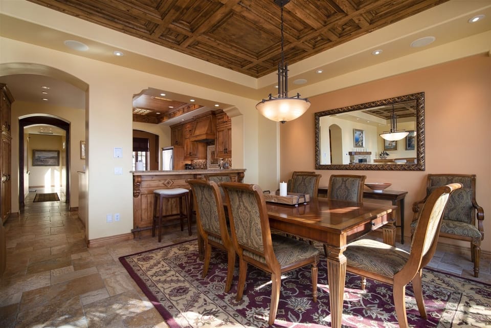 The dining area looks into the kitchen so the chef can socialize while preparing dinner