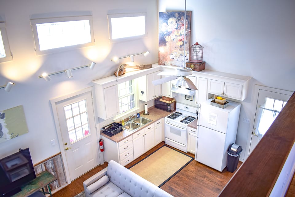 View of full kitchen from upstairs loft