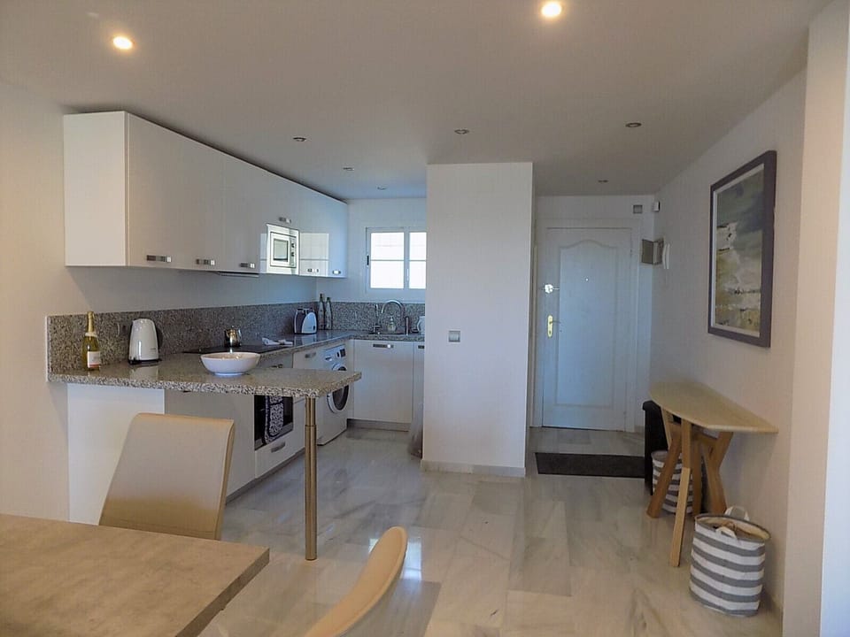 Entrance and open-plan kitchen