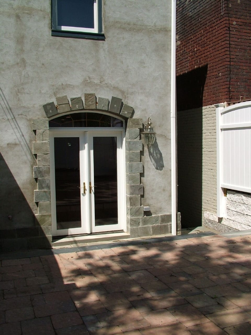 Privet Stone Paved Backyard
