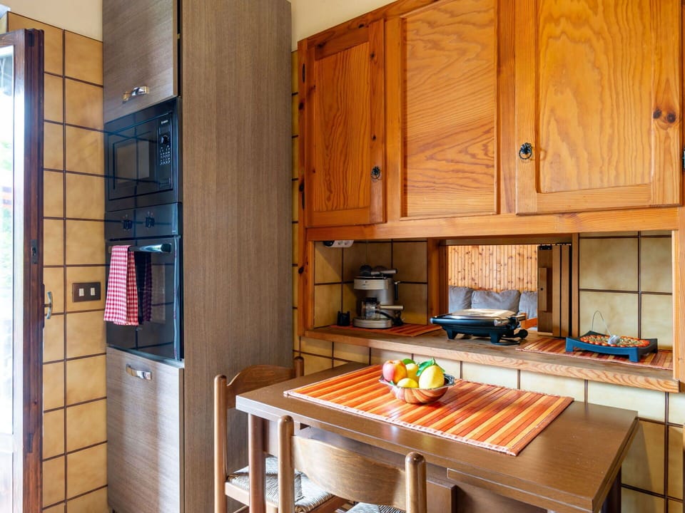 Cabinetry, Property, Table, Wood, Kitchen Appliance, Interior Design, Countertop, Kitchen, Home Appliance, Flooring