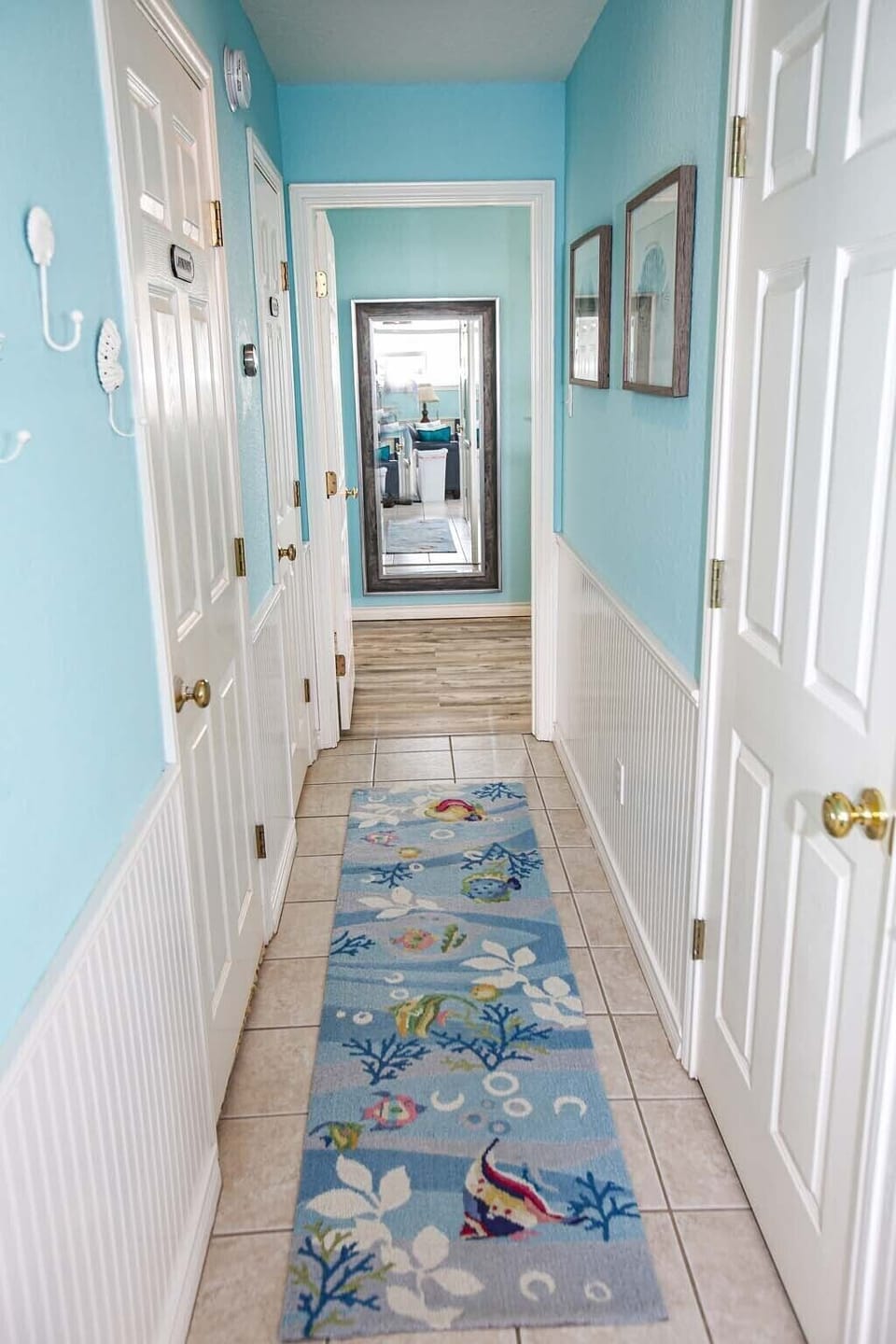Hallway leading to Master Bedroom, includes Laundry and Half Bath