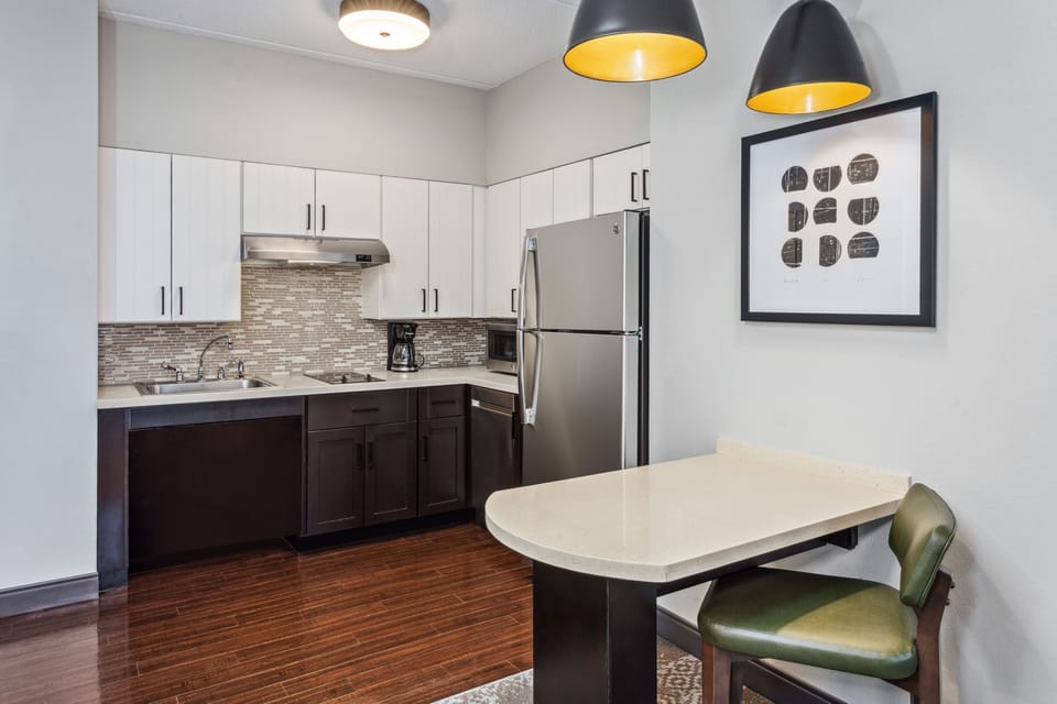 Modern kitchen featuring sleek cabinetry and stainless appliances.