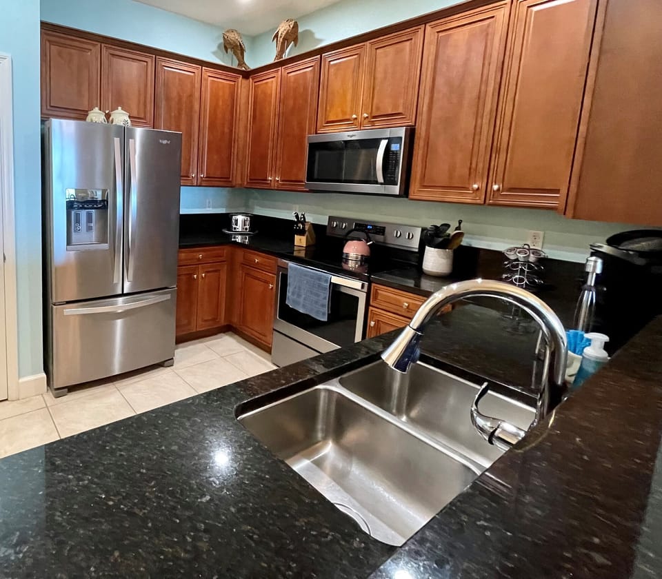 New stainless refrigerator, microwave, dishwasher, and oven!