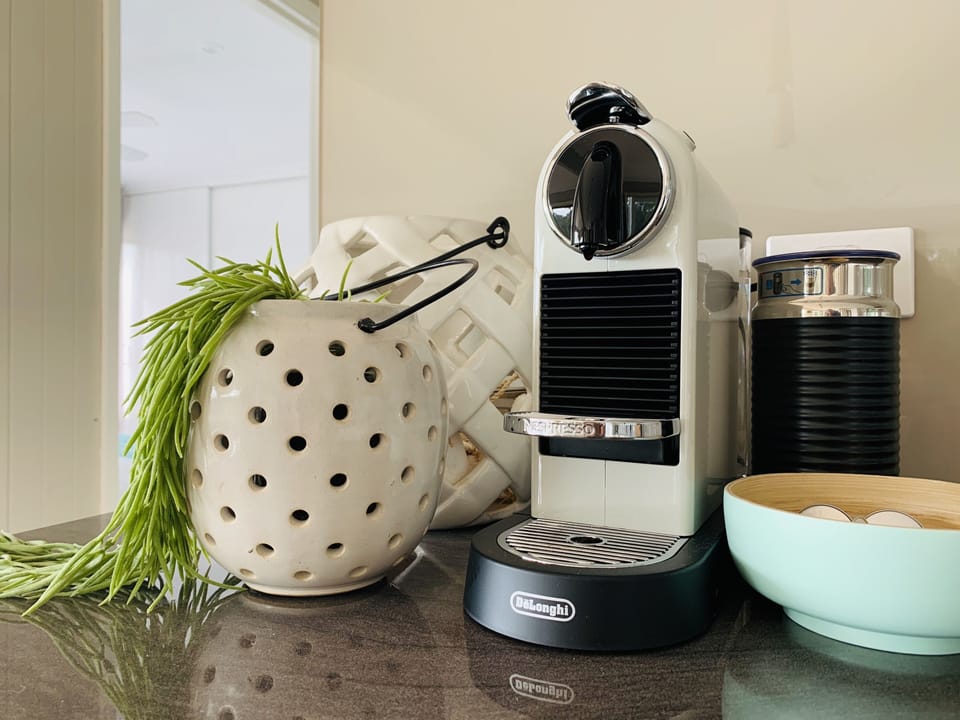 Nespresso machine. Bring coffee pods. 