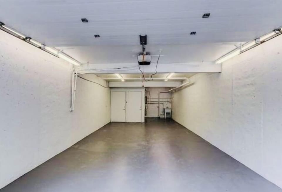 Large garage can fit up to 2 cars. We also have a Tesla charger in the garage!