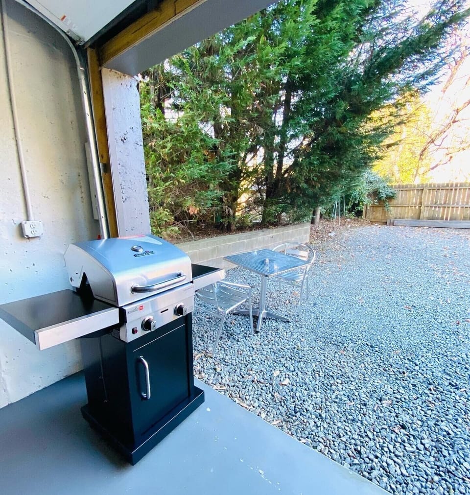 Enjoy the outdoor space with a grill and table/chairs
