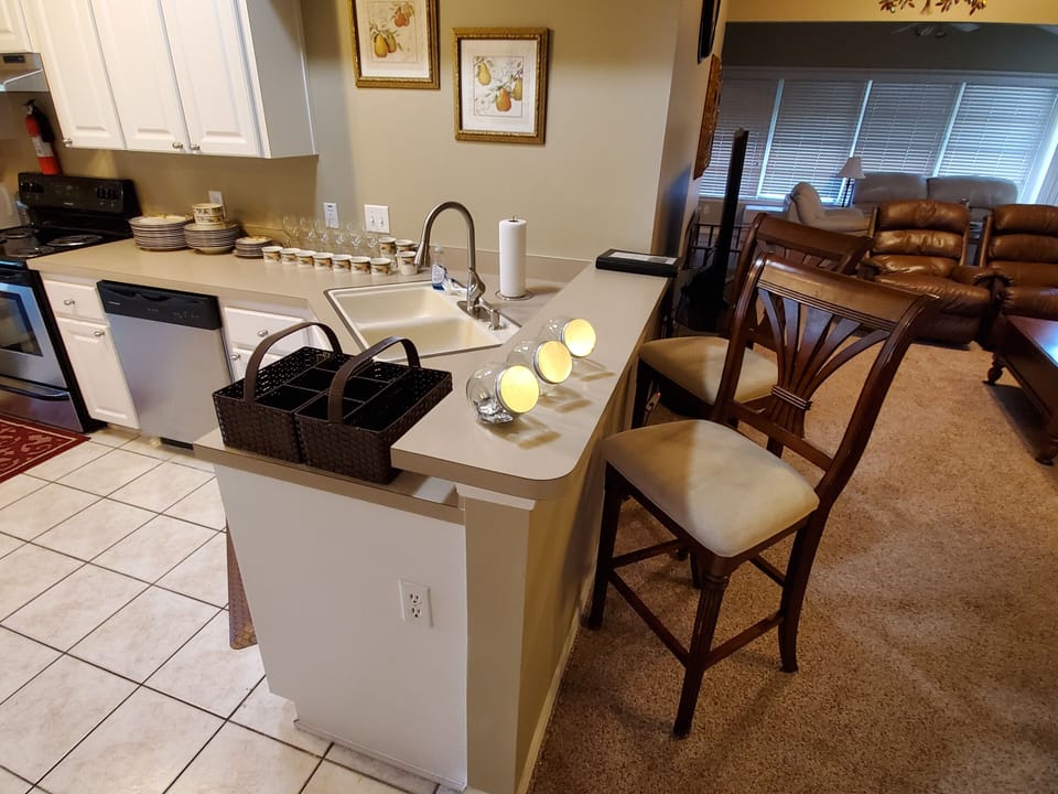 Eating at the bar is fast and convenient with 4 high boy chairs total