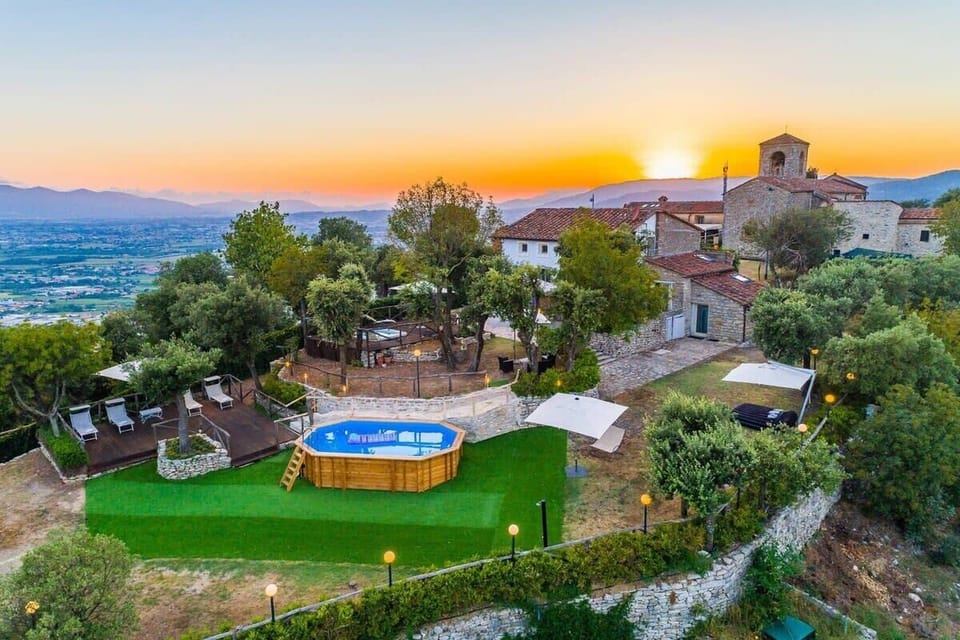 Aerial view of the pool, terraces and villa