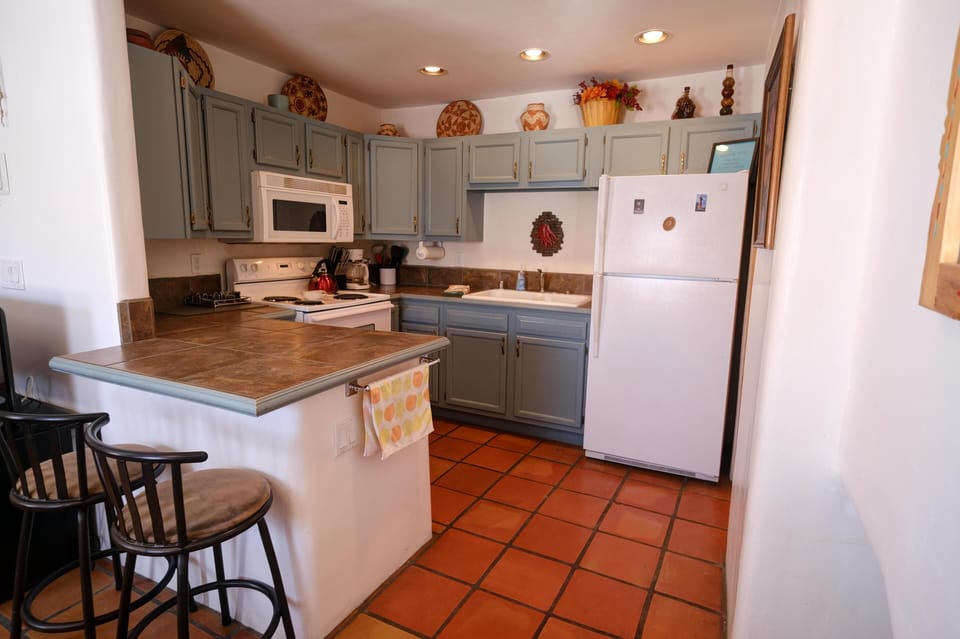 Kitchen with bar stools