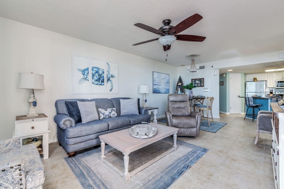 LIVING ROOM AREA WITH RECLINER AND NEW SMART TELEVISION