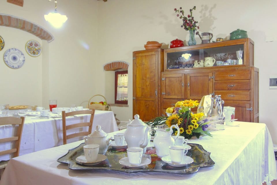 Furniture, Tableware, Table, Tablecloth, Interior Design, Dining Room, Kitchen & Dining Room Table, Serveware, Dishware, Lighting