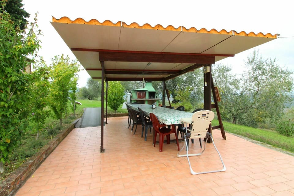 Plant, Table, Property, Sky, Tree, Shade, Outdoor Furniture, Building, Outdoor Table, Door