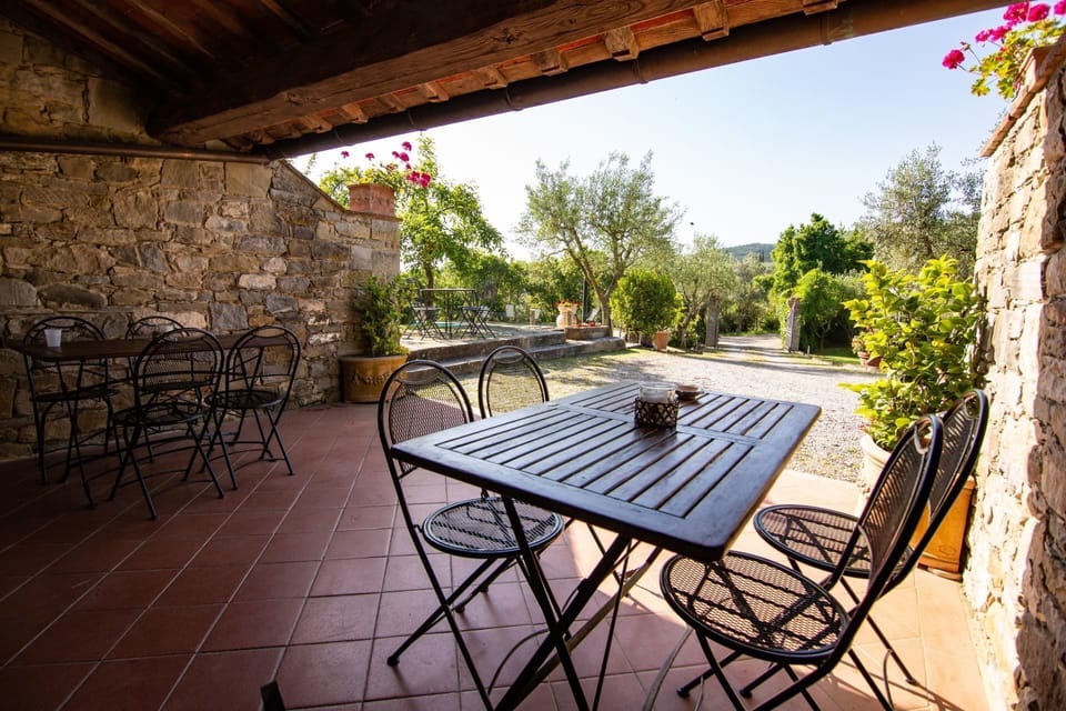 Table, Plant, Property, Furniture, Sky, Outdoor Table, Nature, Wood, Building, Chair