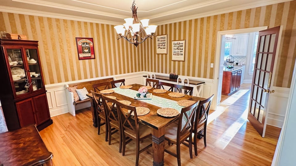 Dining Room table seating 10 comfortably or up to 14 and Bar with 2 Seats