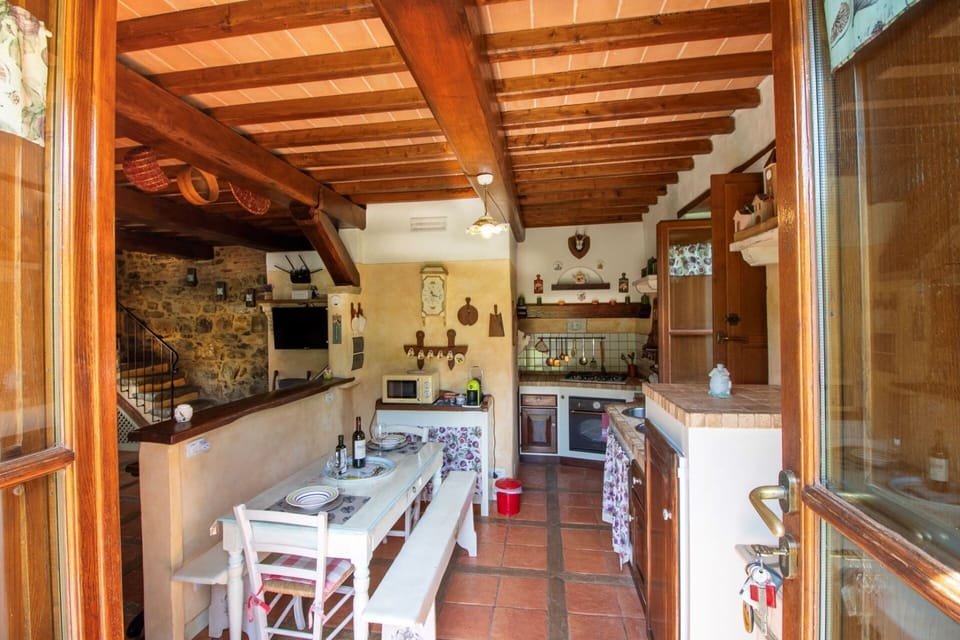 Furniture, Wall, Wood, Flooring, Kitchen, Interior Design, Floor, Countertop, Lighting, Home