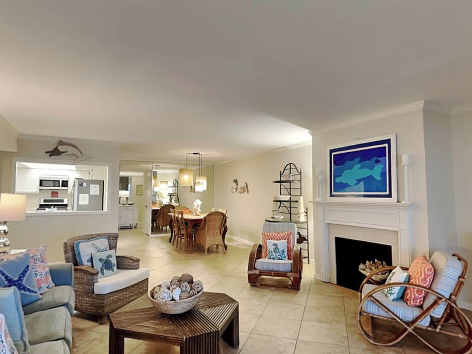 Living Room - Fireplace, Double Sleeper Sofa, Sunroom Access + TV