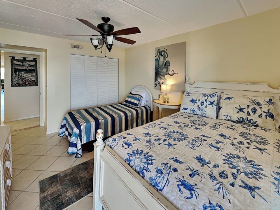 Third Bedroom - TV + Balcony Access