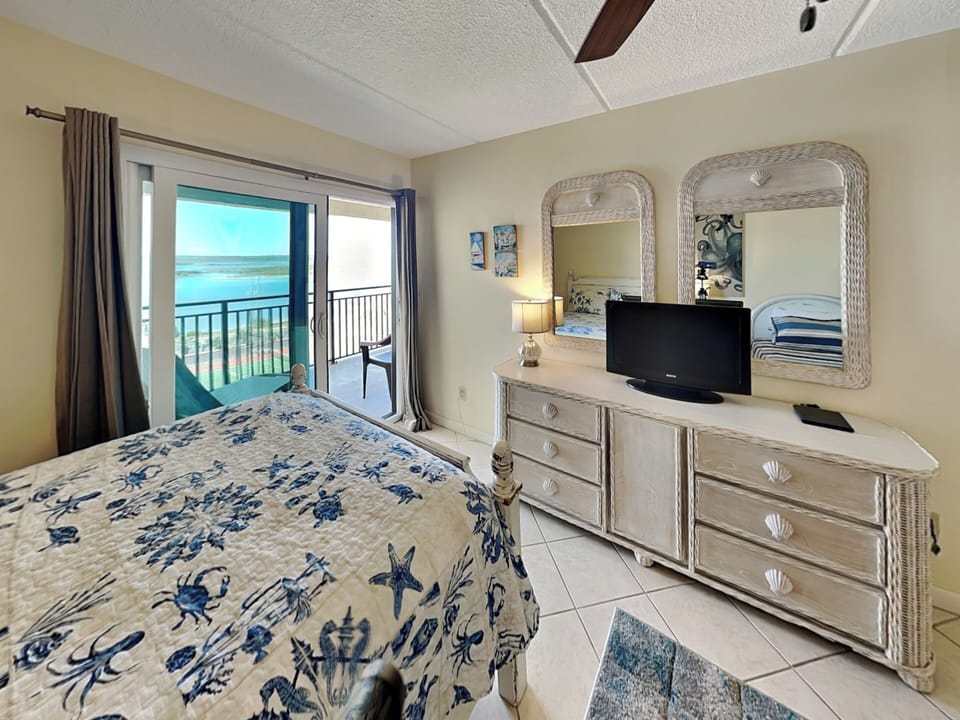 Third Bedroom - TV + Balcony Access