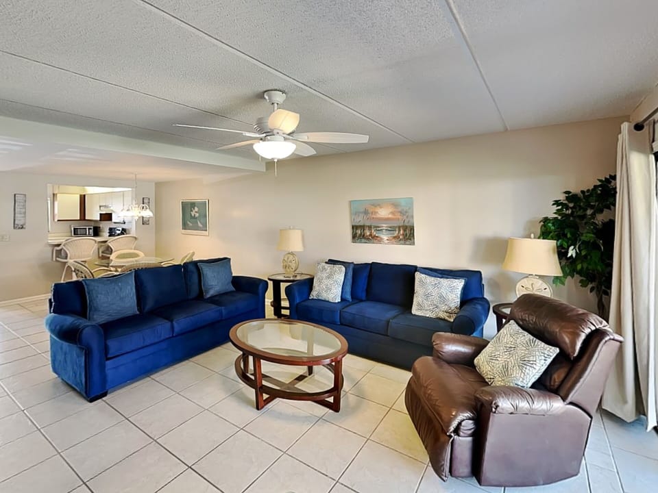 Living Room - Sleeper Sofa, Patio Access + Smart TV