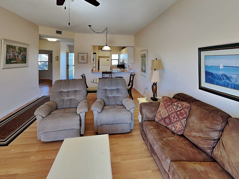 Living Room - Balcony Access, Sleeper Sofa + TV